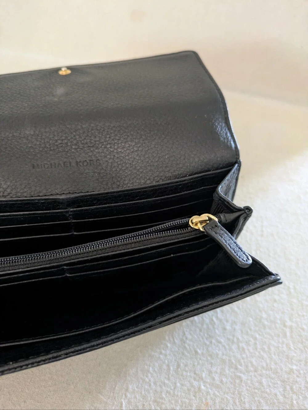 Michael Kors Black Leather Fulton Continental Wallet with Gold MK Emblem